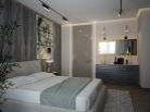 Дизайн спальни с комбинированными стенами Дизайн спальни с комбинированными серо-белыми стенами и современной мебелью.